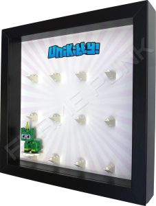 Unikitty Black Frame Lego Display with Dinosaur Unikitty Side View