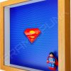 FRAMEPUNK superhero display compatible with single LEGO Superman minifigure (Oak) displaying minifigure - Side view