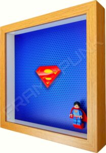 FRAMEPUNK superhero display compatible with single LEGO Superman minifigure (Oak) displaying minifigure - Side view