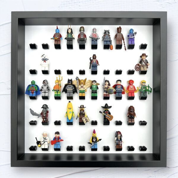 FRAMEPUNK white background display for 50 Lego minifigures, black bricks, black frame, showing minifigures