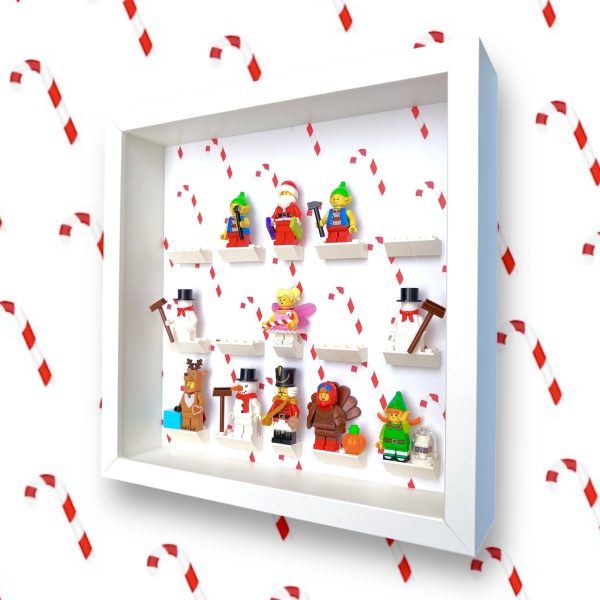 FRAMEPUNK Candy Cane Christmas LEGO minifigure display with white brick mounts. Compatible with Christmas LEGO minifigures. White case. Showing a selection of Christmas LEGO minifigures. Side view