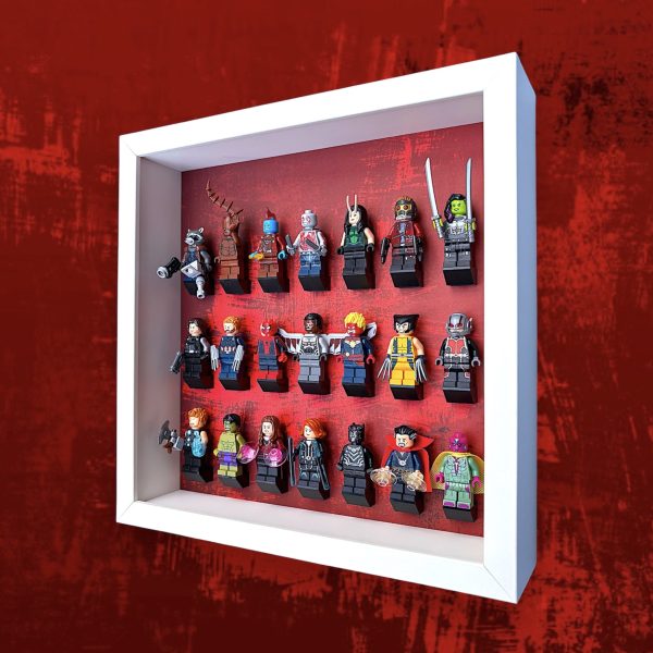 FRAMEPUNK Red Splatter LEGO minifigure display with black brick mounts. Compatible with 21 LEGO minifigures. White case. Showing assorted LEGO superhero minifigures. Side view