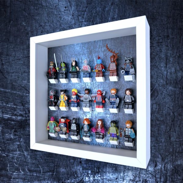 FRAMEPUNK Scratched Steel LEGO minifigure display with white brick mounts. Compatible with 21 LEGO minifigures. White case. Showing assorted LEGO superhero minifigures. Side view