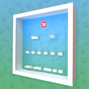 FRAMEPUNK LEGO Minifigures Series 28 Display, White Frame, side view with themed background
