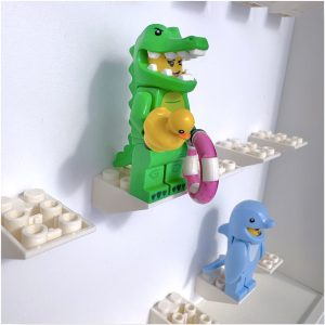 FRAMEPUNK white background and white 2x3 mounts display frame compatible with 21 Lego minifigures (white), showing minifigures, close up